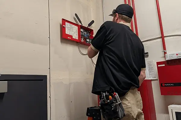 FCSS-Fire-Technician-Serviceing-Fire-Monitoring